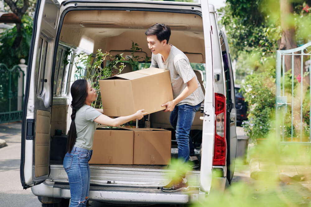 Movers Loading Household Items Into A Moving Truck Union City